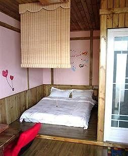 Longtou Cabin Family Hotel - Сямынь Экстерьер фото
