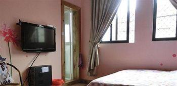 Longtou Cabin Family Hotel - Сямынь Экстерьер фото