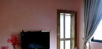 Longtou Cabin Family Hotel - Сямынь Экстерьер фото